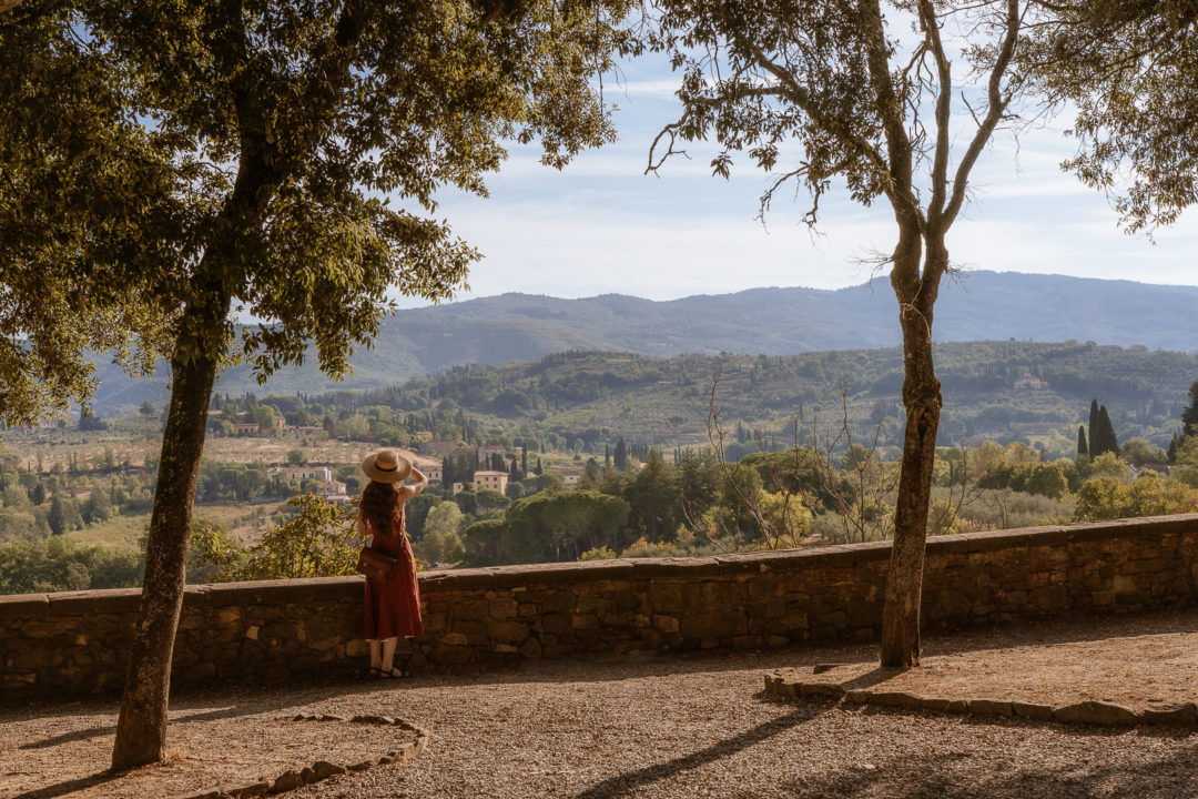 woman overlooking the tuscan hills