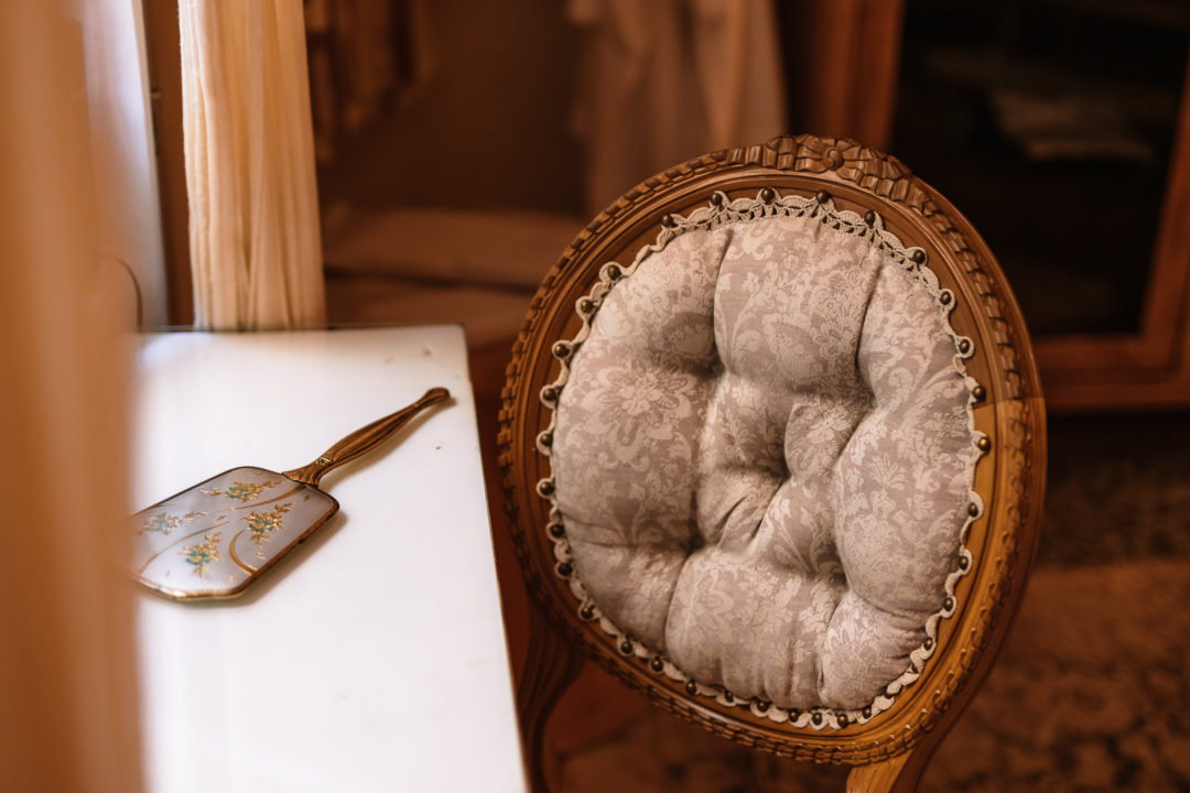 antique chair and antique mirror at shila athens hotel