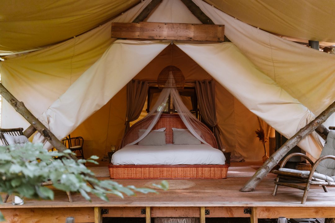 bed in the safari tent at lakhota glamping 