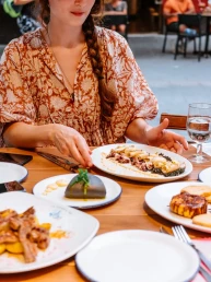 woman having tapas dinner in seville