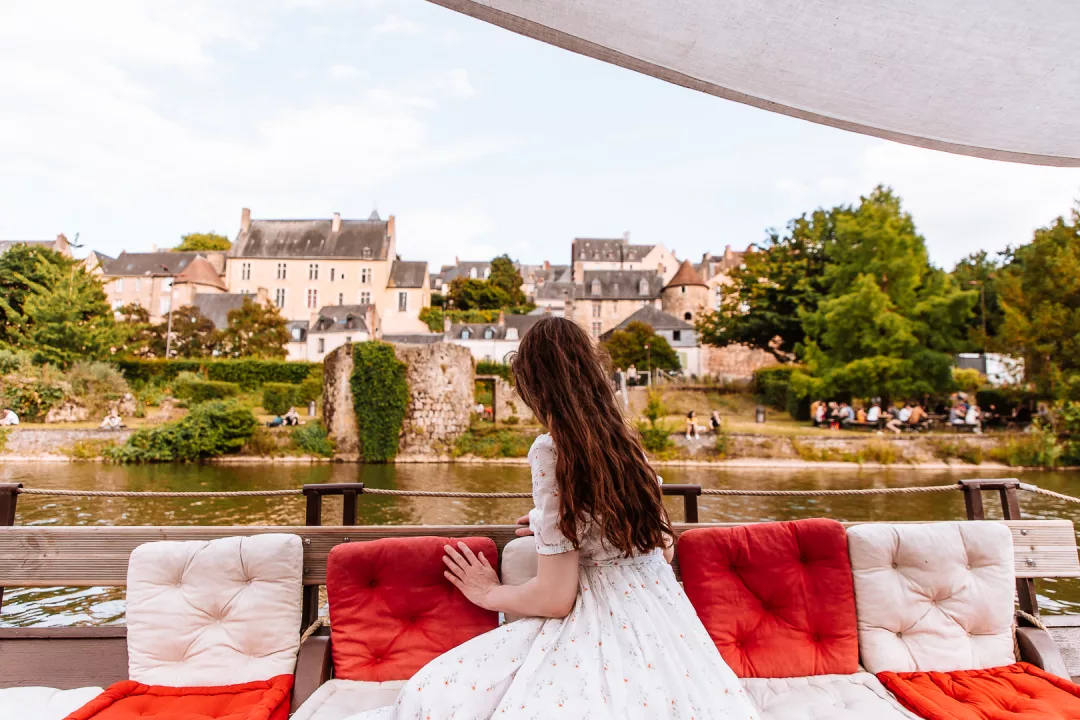 woman on a sarthe river cruise in le mans