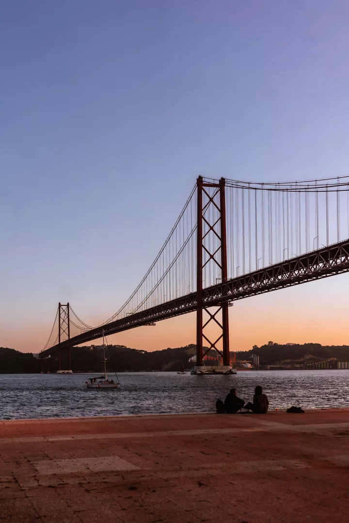 bridge in lisbon at sunset