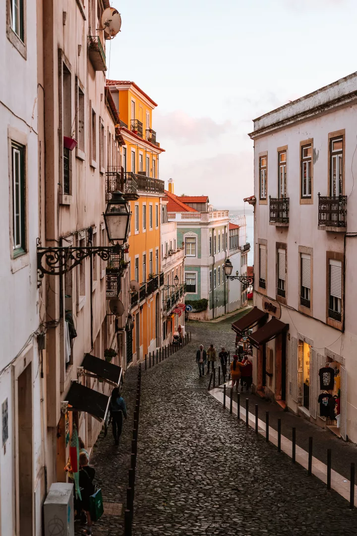 hilly streets of lisbon at sunset