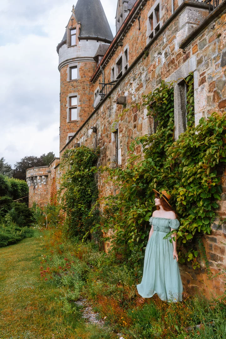 woman in dress at chateau de froidcour castle